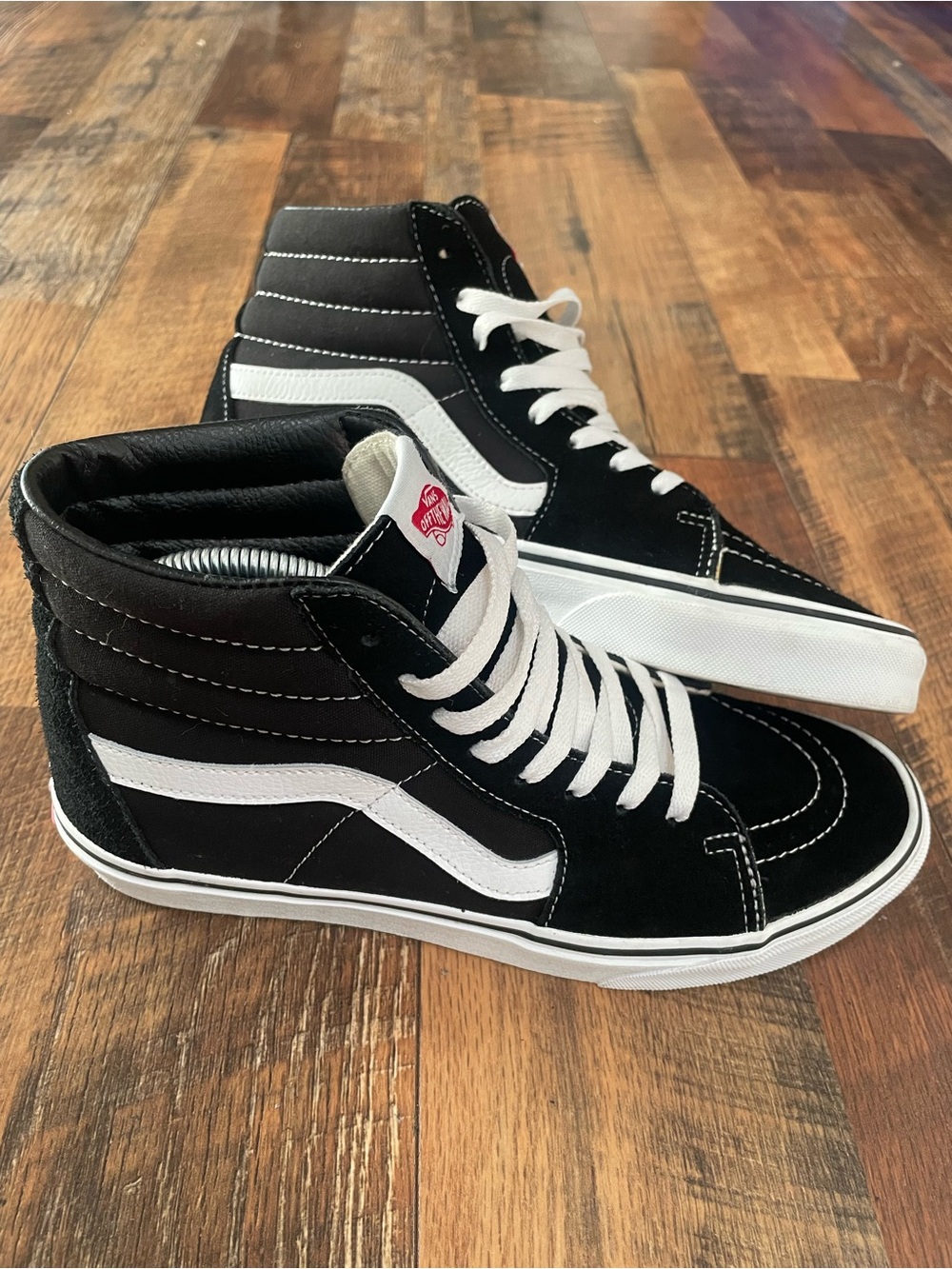 Vans Black and White High-Top Skate Sneakers